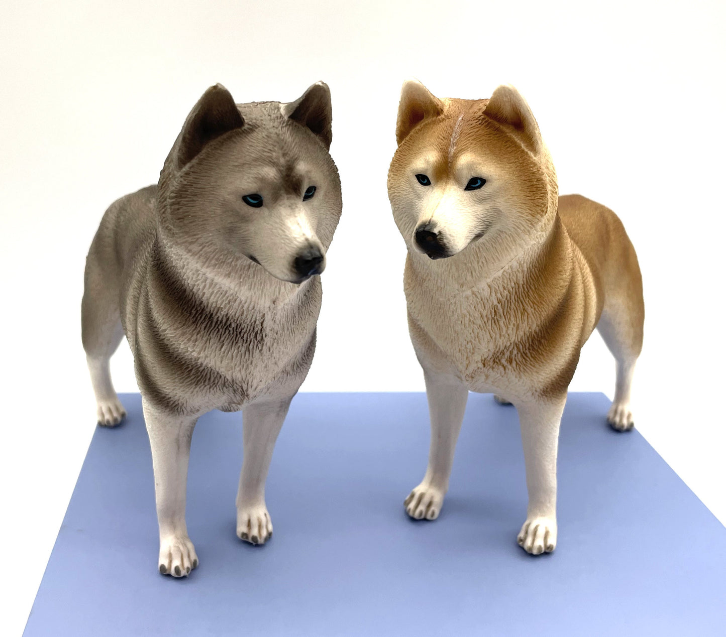 Miniature Alaskan Husky Dogs. Alaskan Malamute. Statue Toy Models