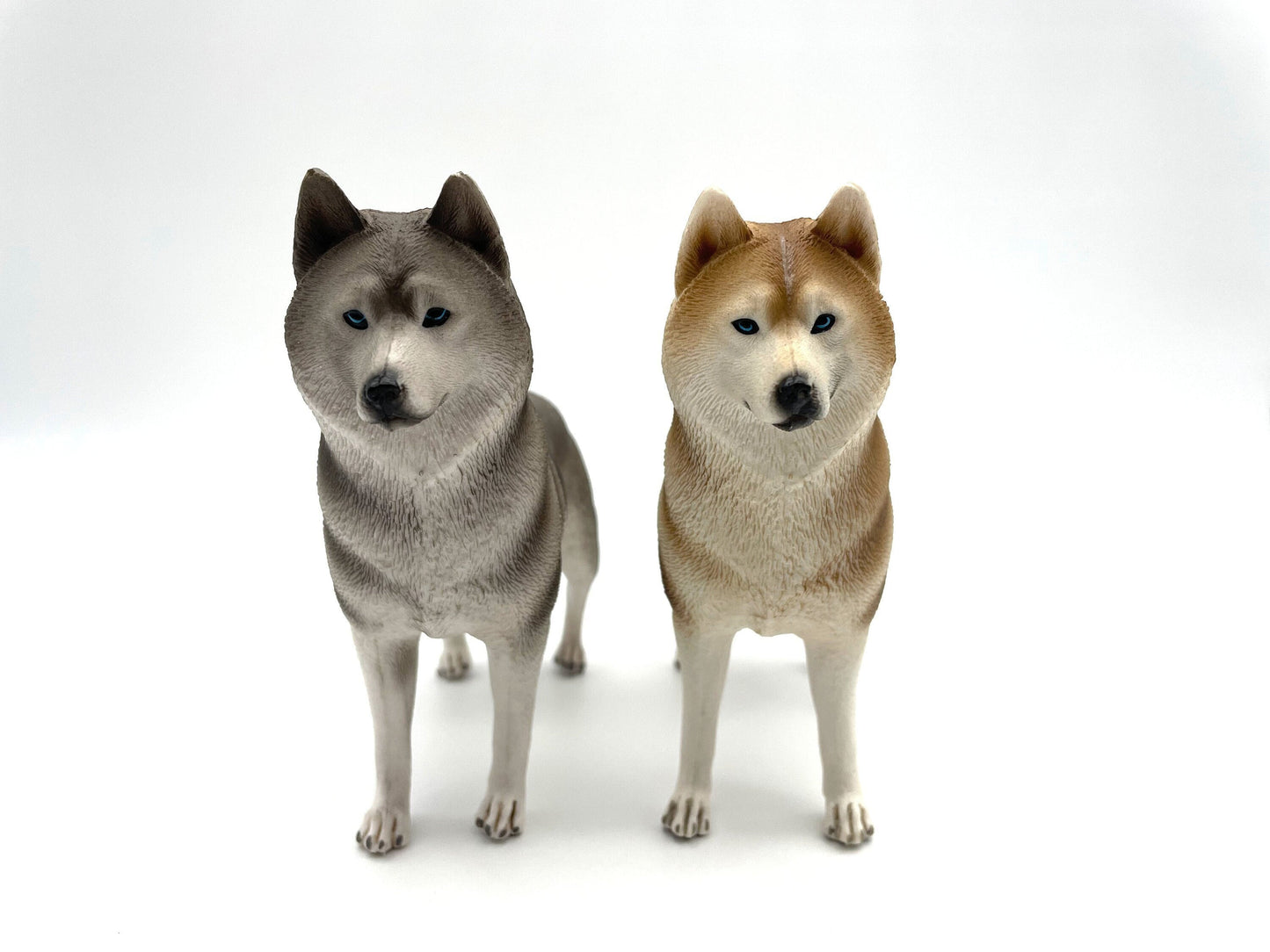 Miniature Alaskan Husky Dogs. Alaskan Malamute. Statue Toy Models