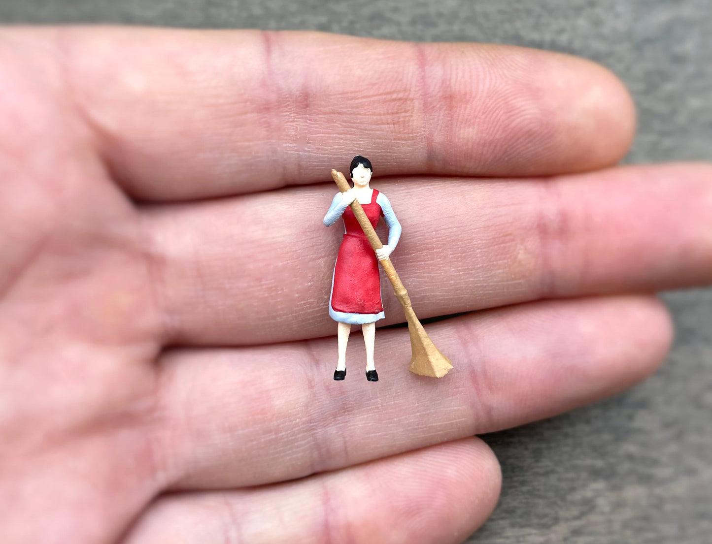 Woman Cleaning, Man Carrying Box. Miniature Human Figures. 1:64 Scale