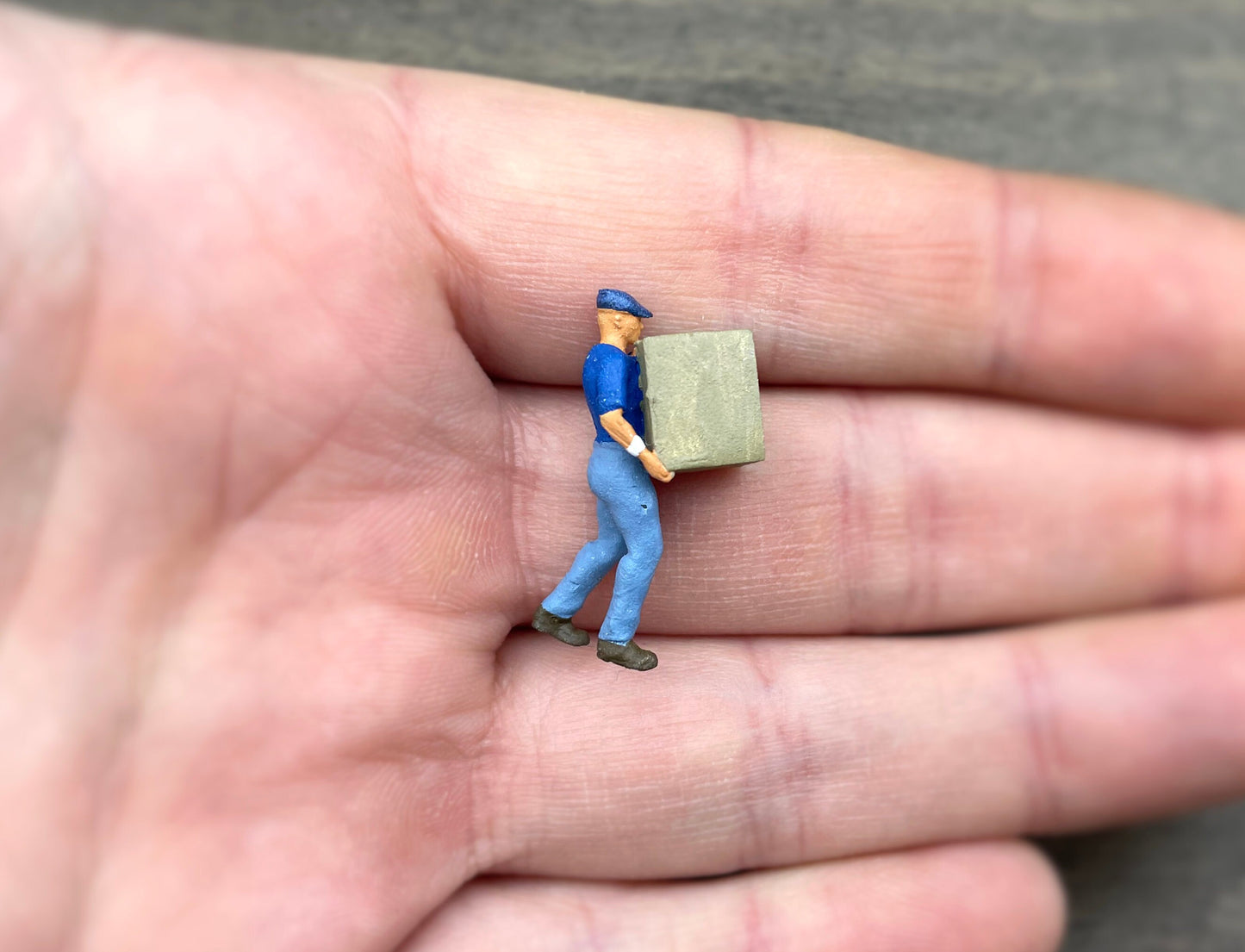 Woman Cleaning, Man Carrying Box. Miniature Human Figures. 1:64 Scale