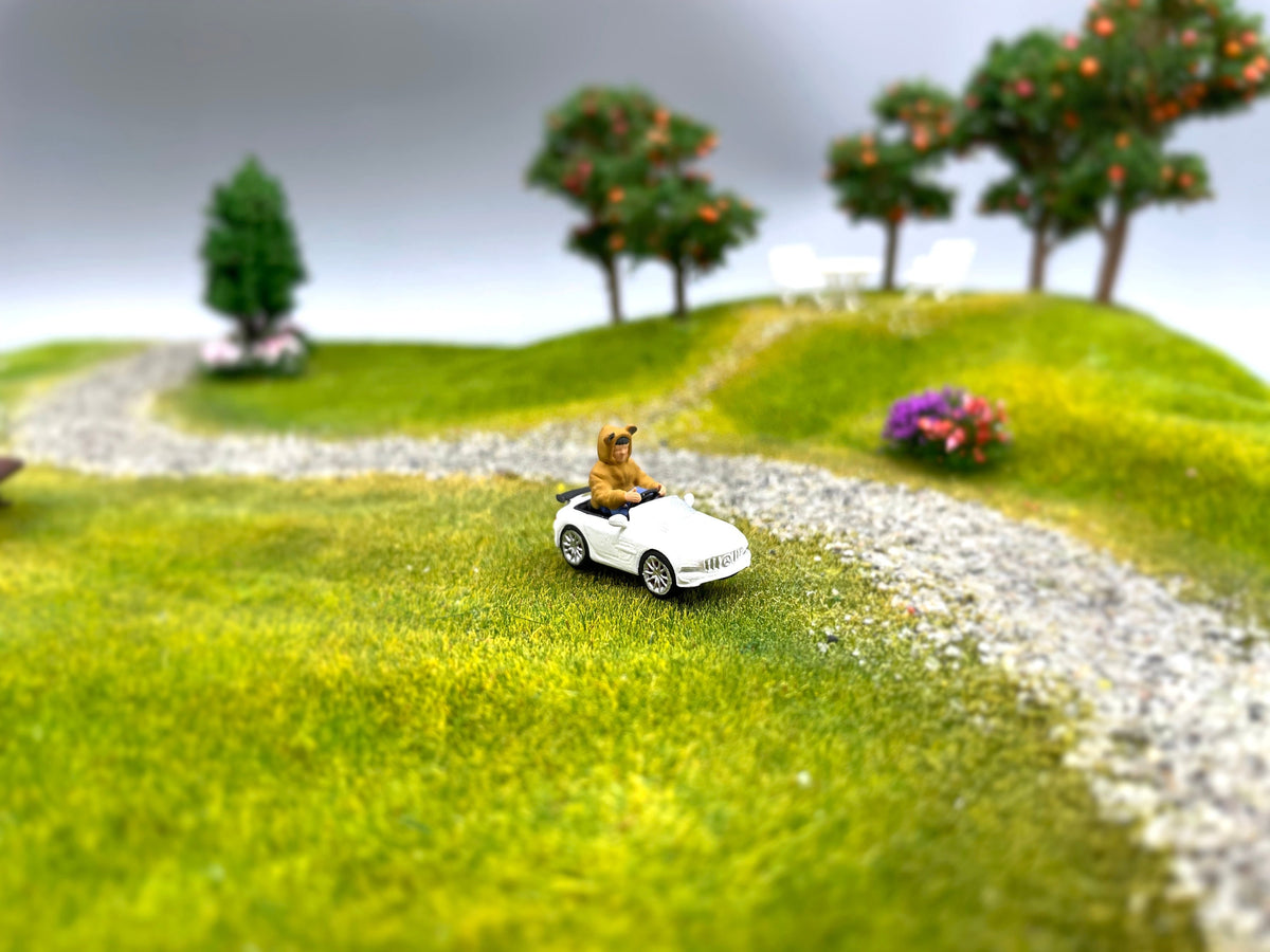Miniature Boy in Electric Toy Car 1:64 Scale Human Figure