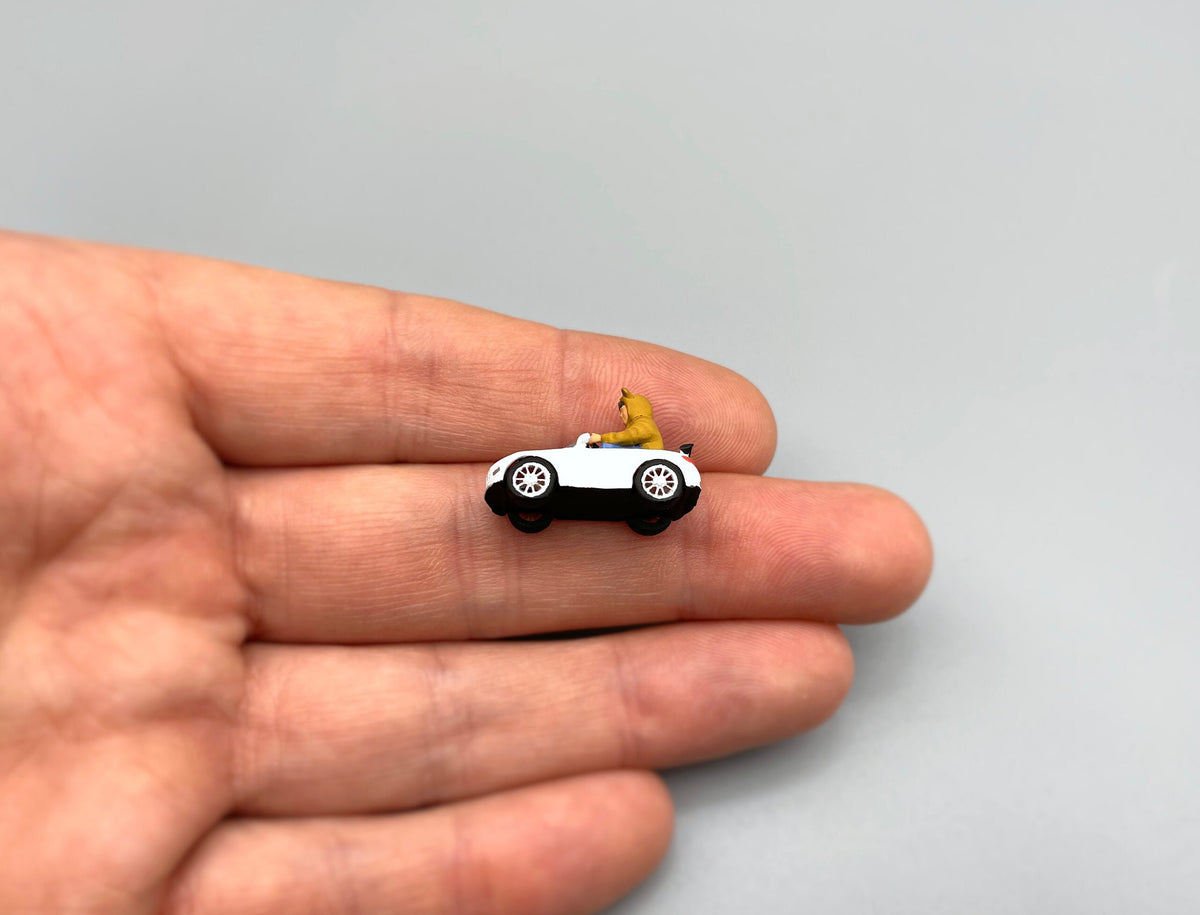 Miniature Boy in Electric Toy Car 1:64 Scale Human Figure