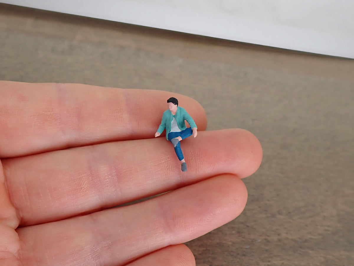 Miniature Seated Person 1:64 Scale Realistic Figure Close-Up