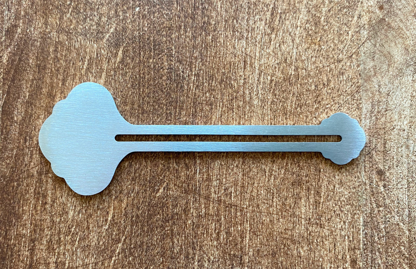 Metal Toothpaste / Paint Tube Squeezers. 1.25" to 3.35" (3.2cm - 8.5cm) Wide.