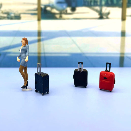 Flight Attendant and Suitcases. Miniature Human Figure. 1:64 Scale