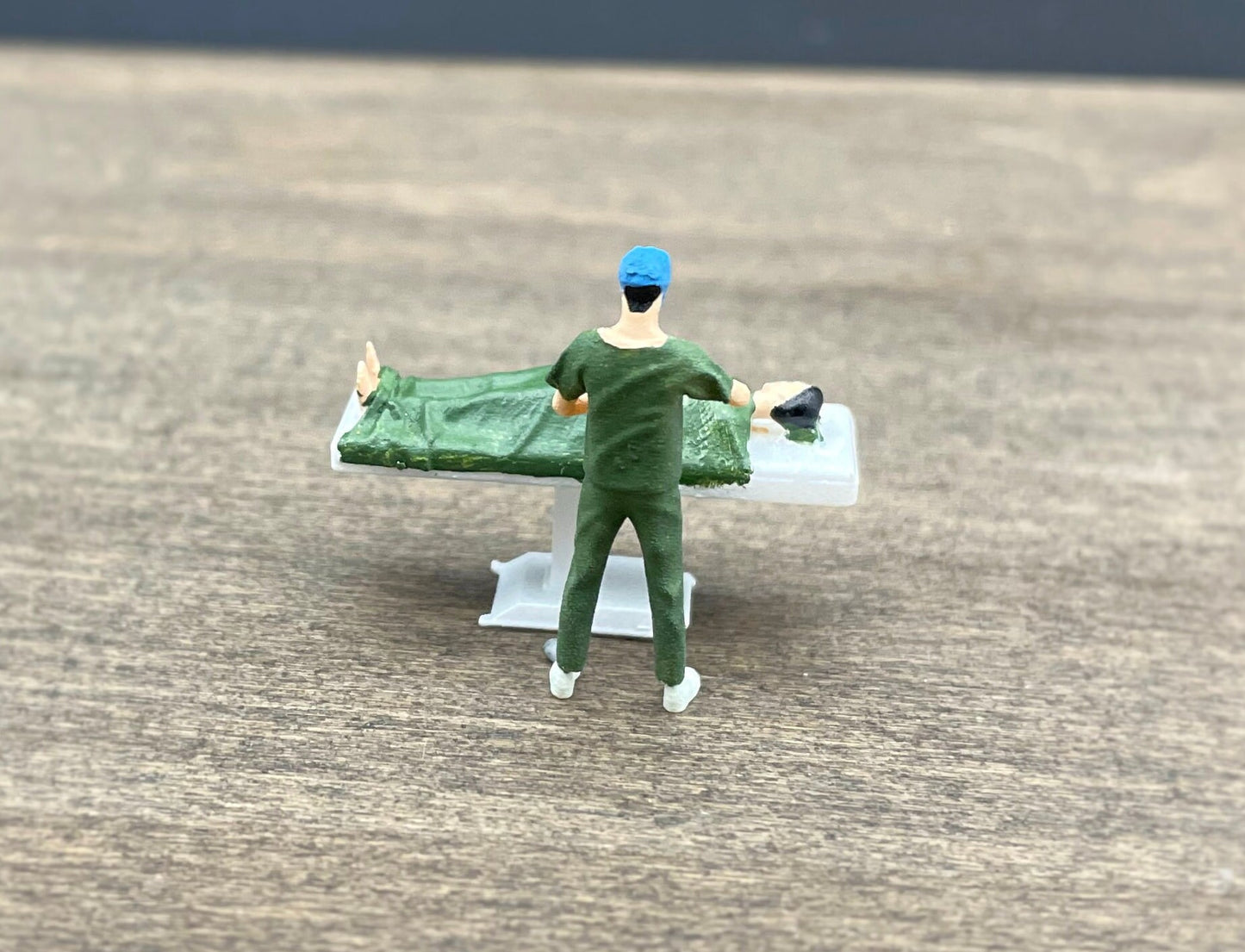 Surgeon Performing Surgery with Patient. Miniature Human Figures. 1:64 Scale