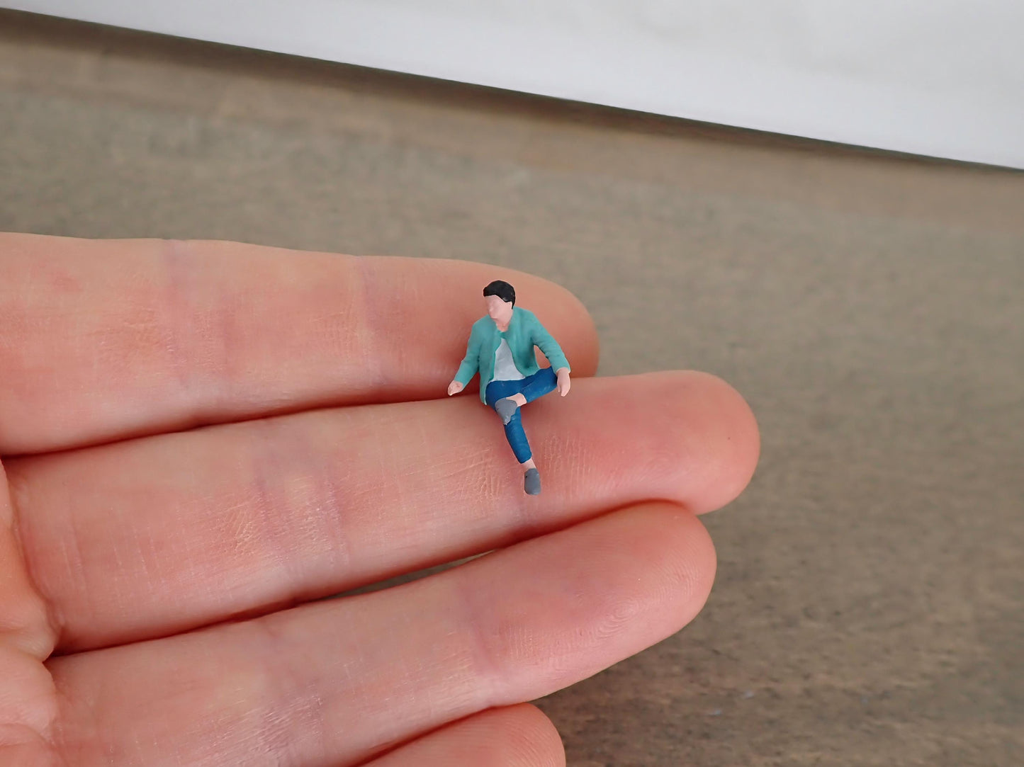 Miniature Seated Person 1:64 Scale Realistic Figure Close-Up